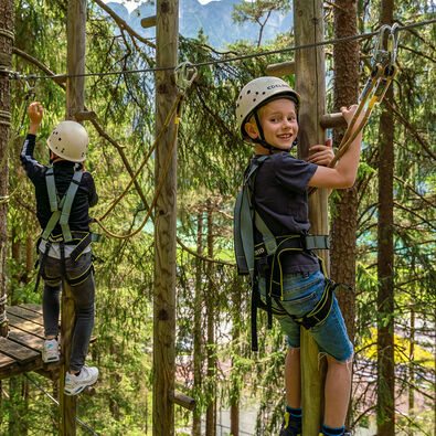 Climbing in the adventure park Achensee in Achenkirch Climbing fun for kids at the Achensee Adventure Park in Achenkirch.