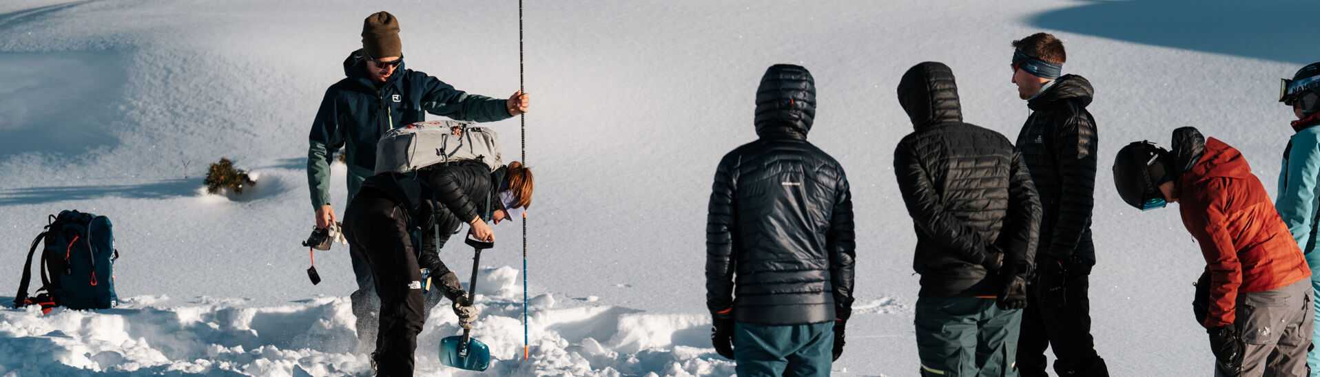 Avalanche safety course in the Rofan mountains Participants of the Achensee ski tour camp learn how to use shovel and probe after an avalanche.