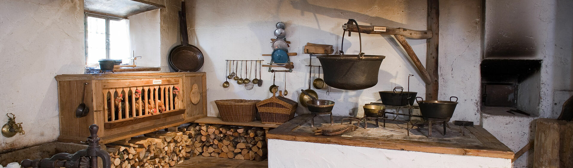 The old open-fire kitchen at the museum Sixenhof of local history in Achenkirch am Achensee.