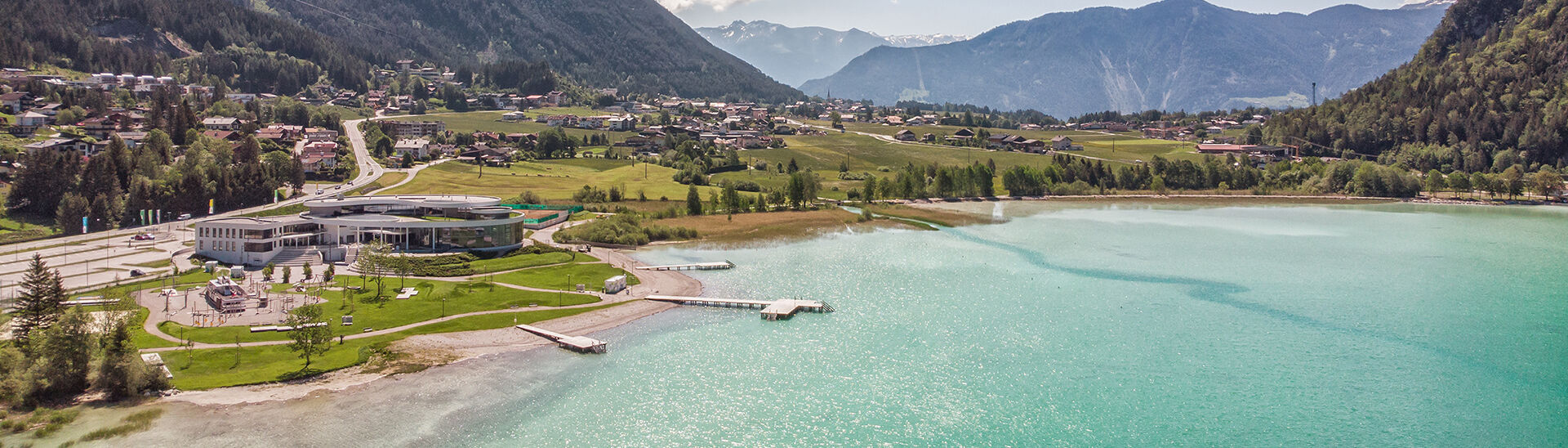 The Atoll in Maurach am Achensee Aerial view of the Atoll Achensee in brilliant sunshine.