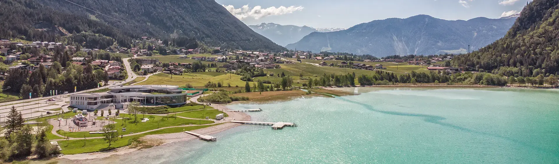 The Atoll in Maurach am Achensee Aerial view of the Atoll Achensee in brilliant sunshine.