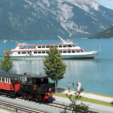 Train and ship at Lake Achensee The launch of the Achenseeschifffahrt and the steam cog railway marked the beginning of tourism at Lake Achensee.