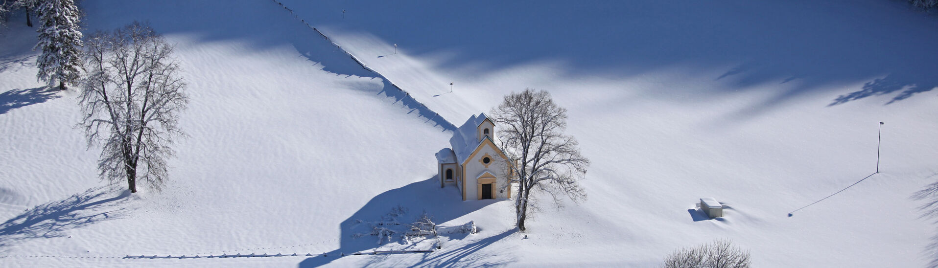 Seehofkapelle in Achenkirch am Achensee The neo-Gothic chapel Seehofkapelle is in Achenkirch am Achensee. There is fresh snow in the picture.