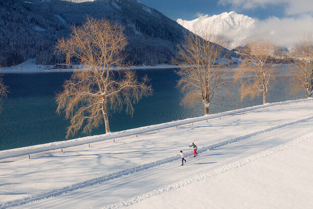 Cross-country skiing in Maurach am Achensee Cross-country ski over 228 kilometres of expertly groomed trails at Lake Achensee, Tirol's largest lake.